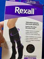 Box front showing Rexall brand, compression sock details, and features including 15-20 mmHg moderate compression and microfiber material.