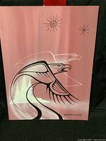 Front view of the original art print titled 'Wob Shikis Id Mkwas (White Bear)' showing stylized eagles and stars with a reddish pink background and forest outline.