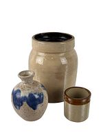 Set of 3 pottery items, large crock in back, small crock on right, vase with blue decor on left
