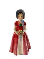 Front angle of Royal Doulton Diana figurine showing full dress, bonnet, and bouquet