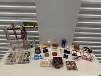 Overview of all jewelry items and accessories on table