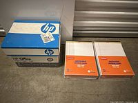 Five reams of HP Office Printer Paper in a blue and white box, 8.5 x 11 inches, 20 lb paper, 2500 sheets.