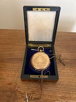 Closed view of engraved front case in box