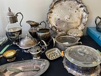 Wide view of lot showing all pieces on table