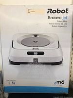 Front of box showing iRobot Braava jet m6 branding and product image