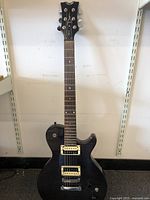 Full front view of the guitar showing body, neck, and headstock