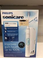 Front side of the box showing Philips Sonicare 5100 ProtectiveClean toothbrush with features and benefits highlighting gum health improvement and advanced sonic technology.