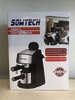 Front of the box showing the coffee maker, brand, model, and key features including single knob function and 12 month warranty.