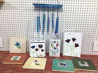 All items grouped: three glass-on-wood boxes, five framed beach glass pictures, blue fused glass chime