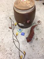 Full lot with crock, metal vine, beaded lizard, tiles