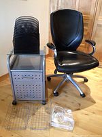 Group shot of chair, file cabinet, file sorter, wire baskets and clear trays