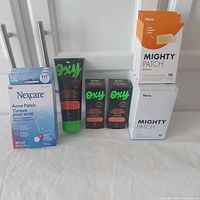 Photo showing all items included: Oxy acne cleanser, Oxy treatment lotions, Nexcare acne patch, Hero Mighty Patch Surface and Hero Mighty Patch Invisible+ boxes all sealed and new