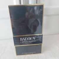 Front view of the sealed Carolina Herrera Bad Boy fragrance box showing branding and size.