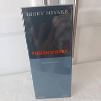 Front view of Issey Miyake Fusion D'Issey Eau de Toilette 100ml box showing branding and product name, in original shrink wrap.