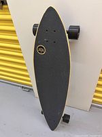 Top view showing black grip tape and Capix logo