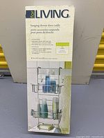 Full view of boxed For Living hanging shower door caddy