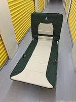 Cot set up with headrest raised