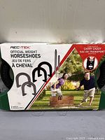 Front of boxed Rec-Tek official weight horseshoes set