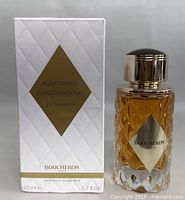 Perfume bottle in original box, showing brand, series, and volume on front.