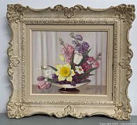 Full view of signed framed floral painting by Marjorie Frith with detailed ornate frame.