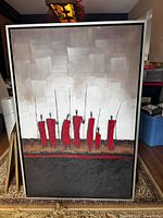 Front view of large abstract tribal-inspired textured painting in frame