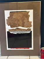 Full view of framed abstract mixed media collage art piece showing layered textures and color blocks.