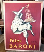 Front view of large mounted Pâtes Baroni poster featuring a whimsical figure with spaghetti on red background.