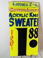 Front of vintage Honest Eds hand painted display sign with pricing and promotional text for acrylic knit sweaters.