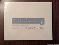 Front view of Artist's Loft Canvas Panels Value Pack showing 5 panels 11x14 inches unopened.