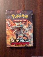 Front view of the Pokemon Sun and Moon Guardians Rising theme deck box featuring Solgaleo artwork.
