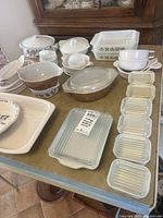 Overview of lot showing mixing bowls, casseroles, baking dishes and refrigerator dishes