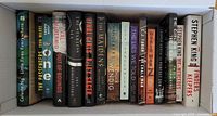 Photo showing the top view of all books in the box laid flat, titles visible