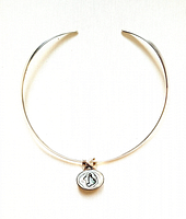 Full view of the sterling silver hard wire collar necklace with attached shell pearl pendant, showing overall design and condition.