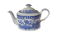 Front-left angle view showing curved spout, handle and floral transferware pattern