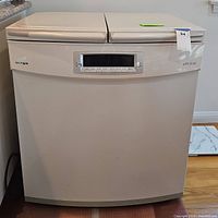 Front view of white Kimchi freestanding refrigerator model DDA 1203 with digital control panel and two top lids, showing condition and design.