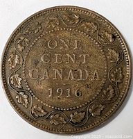 Reverse side of 1916 Canadian one cent penny showing denomination and maple leaf wreath design.