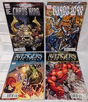 Four Marvel comic books laid out in two rows: top row has Chaos War: Chaos King and Chaos War issues, bottom row has two Avengers Fear Itself issues depicting battles with multiple characters.