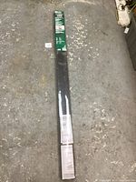 Photo of the sealed hardware kit in packaging on the floor.