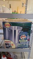 Box of Chef Williams Cajun Injector 30 Quart Deluxe Turkey Fry Kit showing pot and basket images