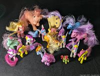 Various My Little Pony toys arranged to show assortment and colors.