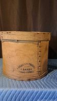 Side view showing Farmers Friend Canada Cool Cured stamp and seam construction