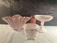 All three glass pieces with soda can for scale