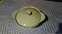 Top view of Dutch oven with lid on displaying overall shape and handles