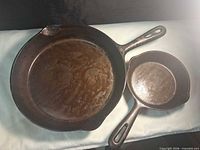 Top view of both skillets showing interior condition and size comparison