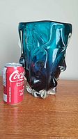 Vase beside soda can for scale, showing overall form and colors
