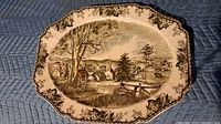Front of platter displaying full rural landscape design and border