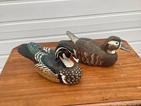 Oblique view of both decoys showing overall form and paint