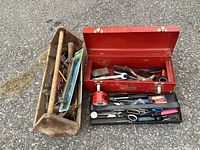 Overall view of Craftsman toolbox, wooden tote and contents