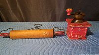 rolling pin and grinder side by side