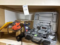 RotoZip Spiral Saw SCS01 LE in case, powered device with various attachments